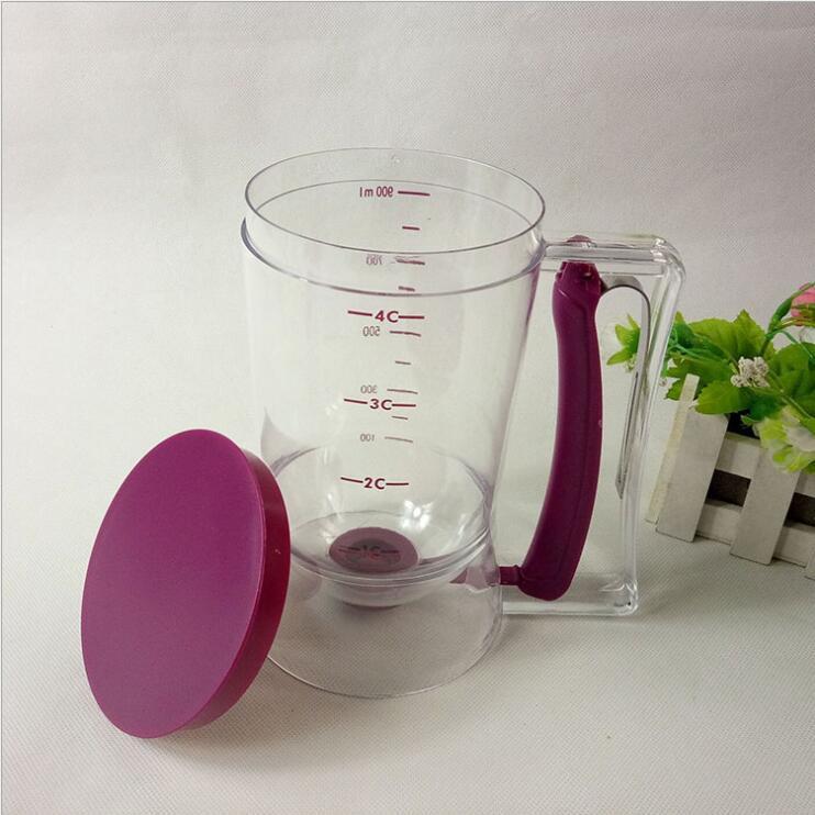 https://zamarah.com/cdn/shop/products/cake-batter-dispenser-baking-tool-jug-plastic-in-pakistan-36172393873652.jpg?v=1637683716