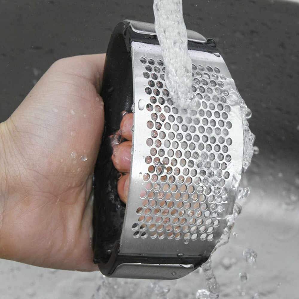 https://zamarah.com/cdn/shop/products/stainless-steel-manual-garlic-grinder-grater-ginger-in-pakistan-28641440006339.jpg?v=1631841288